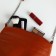 Bag Cross-Bodi with a zipper, the color is red