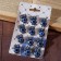 Brooch-reinforcing owl eyes, blue color in black silver (indivisible packing 12 pcs., Price per pcs.)