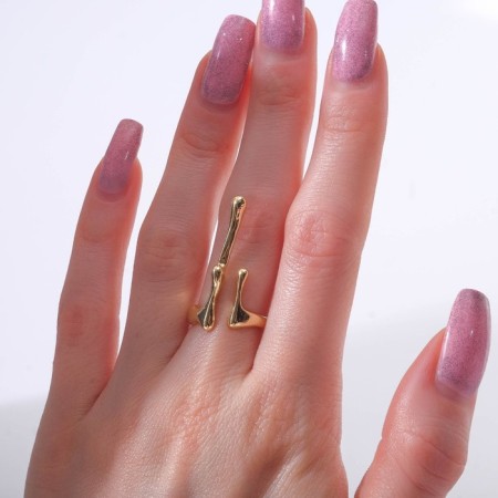 The ring "drops" is uneven, the color is gold, dimensionless-1