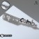 Brooch "Comb" COMB, black and white color in silver