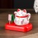 Plastic pendulum from the solar battery "Cat Mani-Neko with flowers" White 8x10x6 cm