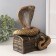 New Year's figure "Cobra on the chest" 20 x 17 x 12 cm.