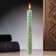 A candle from wax with mint "to increase income", 13x1.7 cm, 1 hour, green