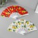 Fan plastic, textiles "Solder of lemons" mix 23 cm