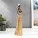 Polystone souvenir "African with a jug in a golden outfit" 33x9x8 cm