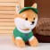 Soft toy "Dog" in a green cap, 23 cm