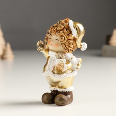 Polystone souvenir "Baby in a gold caftan and cap, with a bird/gift" Mix 4x5x10 cm 94988-4