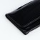 Women's wallet on a magnet, black color