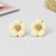 Clips children's "chosen" flower with a heart, color beige-brown