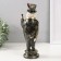 Polystone souvenir "Eagle in the cylinder with a pen, with a cane" 12x10x30 cm