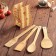 A set of kitchen supplies, 4 items, on a stand