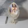 The mirror is desktop, bilateral, with an increase, a mirror surface 13.5 × 18.5 cm, beige color