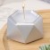 Candle "Hexagon. Marble" in a candlestick of gypsum is small, 7x3.5cm, silver