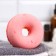 The bath bomb "Donut with coconut sprinkling", red