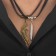 Assorted Pendant "Demetrons" Pistol and a bullet, colored on a black lace, 45 cm