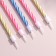 Unsuched candles for the spiral cake, set: 10 pcs and 10 stands