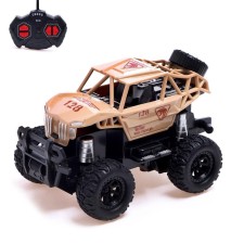 The radio -controlled “Army” jeep works on batteries, sand color