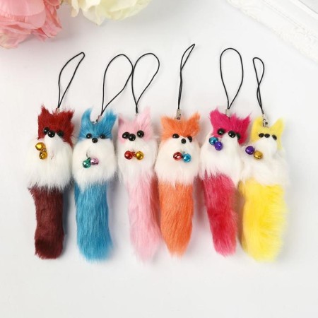 Fluffing on a pendant with colored bells mix-3