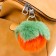 Fluffy on a ring with a carbine "persimmon" d = 8 cm