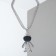 Cosmonaut's pendant pendant, black color in silver, 70 cm