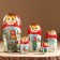 Matryoshka "couple", red scarf, 5 puppet, suite