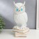 Souvenir ceramics "White Eagle owl on books" with gold 29x14.5x14 cm