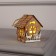 Christmas tree toy "House with Santa Claus on the sled", from batteries, glow warm white