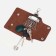 Key on the buttons, length 11 cm, 7 carabiners, brown color