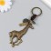 Metal keychain, giraffe leatherette, node 4x13 cm