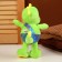 Soft toy "Dragosh", in slippers, 22 cm, green color