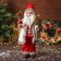 Santa Claus "in a checkered shirt, with twigs and skis" moves, 45x24 cm, red