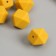 Busina silicone "polyhedron" mustard d = 1.7 cm