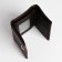 Male purse on a magnet, department for bills, for maps, for coins, brown color