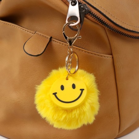 Fluffy on a ring with a carbine "Smile" yellow 8x8 cm