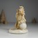 Polystone candlestick "Santa Claus in a brown fur coat with a snowman" d = 3? 5 cm 10.3x9.8x14 cm