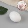 Clay egg, 4 × 4 × 6 cm, white color