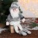 Soft toy "Santa Claus with a bell - long legs" 10*40 cm silver