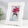 Photo frame plastic 10x15 cm "Rose and curls of rose" white 20.5x15.5 cm