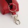Key of zipper, length 16 cm, ring, carbine, red color