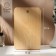 The cutting board with the hole ADELICA, 24 × 15 × 1.8 cm, covered with oil, whole birch