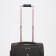 Small 20 suitcase, lightning department, code castle, 3 wheels, 2 outer pockets, brown color