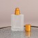 Glass bottle for perfume, with a spray, 30 ml, golden color