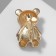Brooch "Bear" in a sweater, red color in matte gold