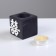 A candle in a wooden candlestick "Cube, hieroglyphs. Happiness", color: "Eben", 6x6x6 cm, mango