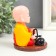 Plastic pendulum from the solar battery "Little Buddha with Cars" 11x8.5x8.5 cm