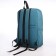 Young backpack from textiles on a zipper, waterproof, 4 pockets, green color