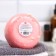 The bath bomb "Donut with coconut sprinkling", red