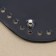 Donce for a bag, with legs, oval, 25 × 12 × 0.3 cm, black/silver color