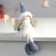 Interior doll "Angel in a fur coat made of grass, in a blue cap and boots" 30x15x5 cm