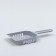 A scoop for cleaning a cat toilet, gray